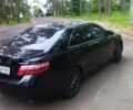 Черный Тойота Камри, объемом двигателя 2.36 л и пробегом 242 тыс. км за 11100 $, фото 3 на Automoto.ua