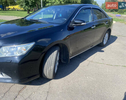 Черный Тойота Камри, объемом двигателя 2.5 л и пробегом 262 тыс. км за 13500 $, фото 1 на Automoto.ua