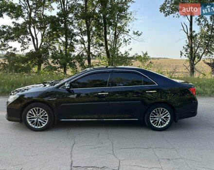 Черный Тойота Камри, объемом двигателя 2.49 л и пробегом 188 тыс. км за 13500 $, фото 2 на Automoto.ua