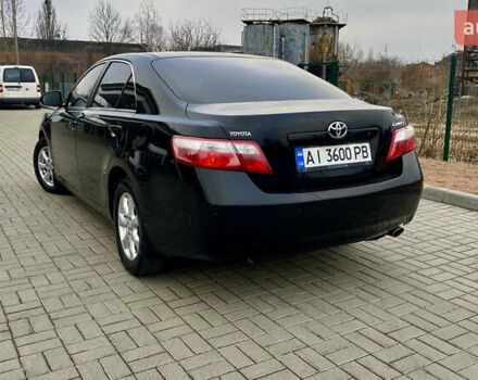 Черный Тойота Камри, объемом двигателя 2.4 л и пробегом 315 тыс. км за 9799 $, фото 9 на Automoto.ua