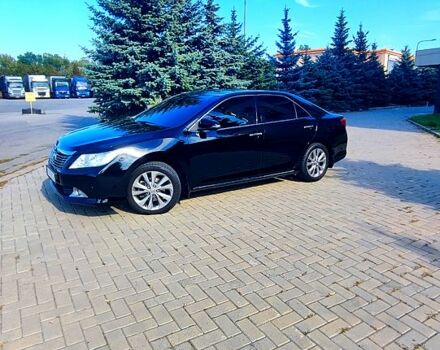 Черный Тойота Камри, объемом двигателя 2.5 л и пробегом 180 тыс. км за 13100 $, фото 1 на Automoto.ua