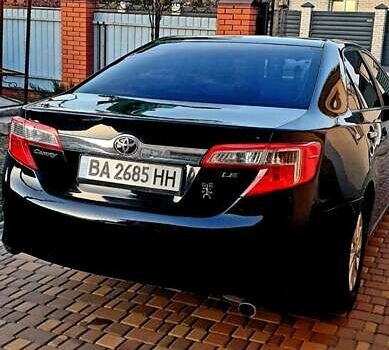 Черный Тойота Камри, объемом двигателя 2.5 л и пробегом 154 тыс. км за 9490 $, фото 12 на Automoto.ua