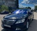 Черный Тойота Камри, объемом двигателя 2.49 л и пробегом 189 тыс. км за 13500 $, фото 1 на Automoto.ua