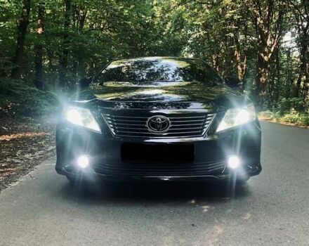 Черный Тойота Камри, объемом двигателя 2.5 л и пробегом 250 тыс. км за 13000 $, фото 12 на Automoto.ua