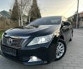 Черный Тойота Камри, объемом двигателя 2.5 л и пробегом 220 тыс. км за 13750 $, фото 1 на Automoto.ua