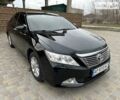 Черный Тойота Камри, объемом двигателя 2.49 л и пробегом 208 тыс. км за 13499 $, фото 1 на Automoto.ua