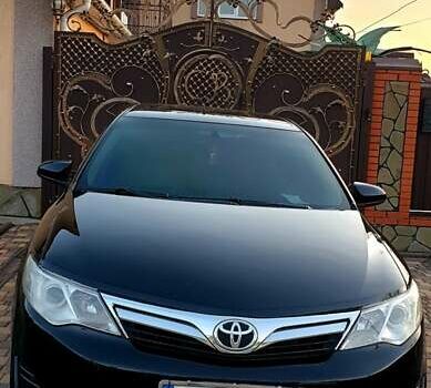 Черный Тойота Камри, объемом двигателя 2.5 л и пробегом 154 тыс. км за 9490 $, фото 4 на Automoto.ua