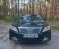 Черный Тойота Камри, объемом двигателя 2.5 л и пробегом 260 тыс. км за 13600 $, фото 1 на Automoto.ua