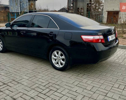 Черный Тойота Камри, объемом двигателя 2.4 л и пробегом 315 тыс. км за 9799 $, фото 10 на Automoto.ua