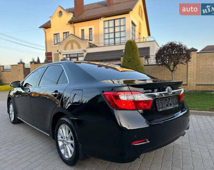 Черный Тойота Камри, объемом двигателя 2.5 л и пробегом 220 тыс. км за 13750 $, фото 15 на Automoto.ua