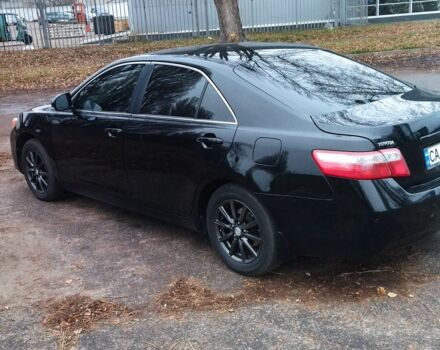 Черный Тойота Камри, объемом двигателя 2.4 л и пробегом 248 тыс. км за 10500 $, фото 1 на Automoto.ua