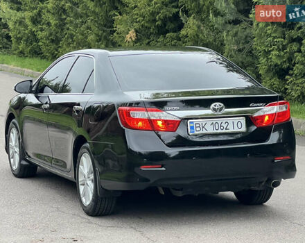 Черный Тойота Камри, объемом двигателя 2.5 л и пробегом 198 тыс. км за 13500 $, фото 4 на Automoto.ua
