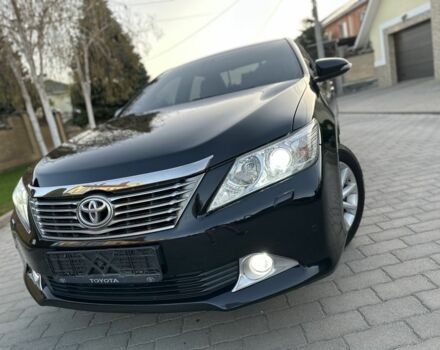 Черный Тойота Камри, объемом двигателя 2.5 л и пробегом 220 тыс. км за 13750 $, фото 2 на Automoto.ua