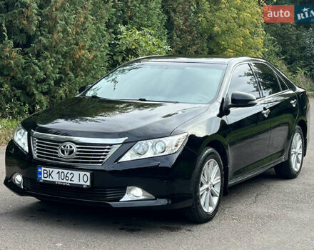 Черный Тойота Камри, объемом двигателя 2.5 л и пробегом 198 тыс. км за 12950 $, фото 2 на Automoto.ua