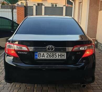 Черный Тойота Камри, объемом двигателя 2.5 л и пробегом 154 тыс. км за 9490 $, фото 30 на Automoto.ua