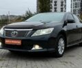 Черный Тойота Камри, объемом двигателя 2.49 л и пробегом 236 тыс. км за 11500 $, фото 1 на Automoto.ua