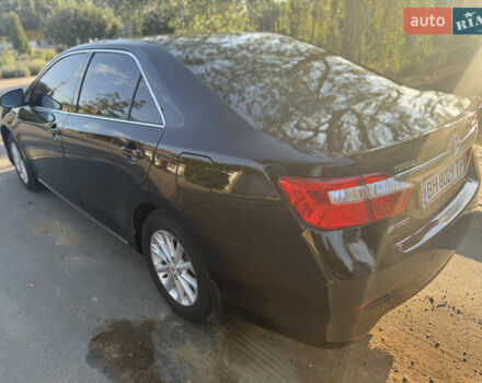 Чорний Тойота Камрі, об'ємом двигуна 2.49 л та пробігом 208 тис. км за 13500 $, фото 18 на Automoto.ua
