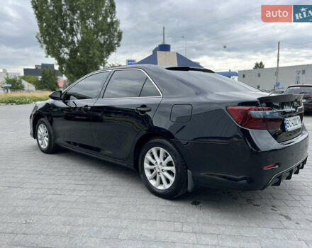 Черный Тойота Камри, объемом двигателя 2.5 л и пробегом 280 тыс. км за 12900 $, фото 5 на Automoto.ua