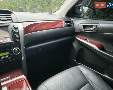 Черный Тойота Камри, объемом двигателя 2.5 л и пробегом 198 тыс. км за 13500 $, фото 19 на Automoto.ua