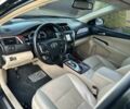 Черный Тойота Камри, объемом двигателя 2.5 л и пробегом 220 тыс. км за 13750 $, фото 15 на Automoto.ua