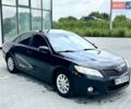 Черный Тойота Камри, объемом двигателя 2.5 л и пробегом 290 тыс. км за 9900 $, фото 1 на Automoto.ua