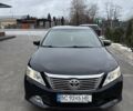 Чорний Тойота Камрі, об'ємом двигуна 2.49 л та пробігом 369 тис. км за 10500 $, фото 1 на Automoto.ua