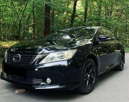 Черный Тойота Камри, объемом двигателя 2.5 л и пробегом 250 тыс. км за 13000 $, фото 26 на Automoto.ua