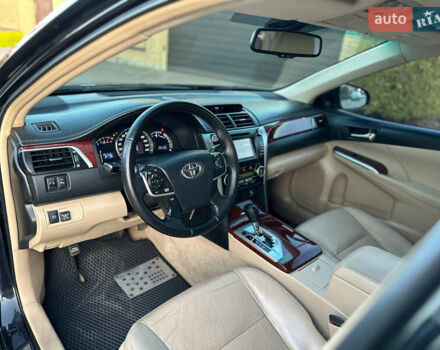 Черный Тойота Камри, объемом двигателя 2.5 л и пробегом 220 тыс. км за 13750 $, фото 28 на Automoto.ua