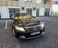 Черный Тойота Камри, объемом двигателя 2.49 л и пробегом 130 тыс. км за 14100 $, фото 1 на Automoto.ua