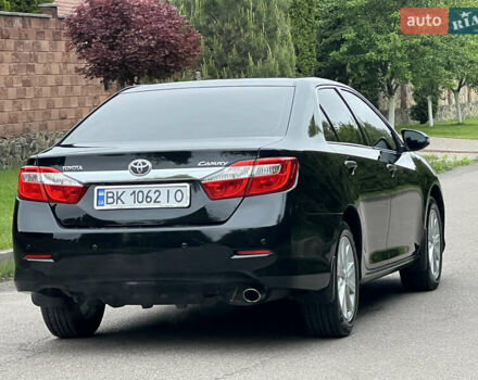 Черный Тойота Камри, объемом двигателя 2.5 л и пробегом 198 тыс. км за 13500 $, фото 5 на Automoto.ua