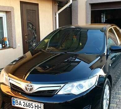 Черный Тойота Камри, объемом двигателя 2.5 л и пробегом 154 тыс. км за 9490 $, фото 31 на Automoto.ua