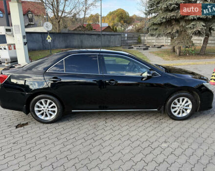 Чорний Тойота Камрі, об'ємом двигуна 2.5 л та пробігом 233 тис. км за 13500 $, фото 1 на Automoto.ua