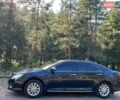 Чорний Тойота Камрі, об'ємом двигуна 2.5 л та пробігом 230 тис. км за 12990 $, фото 1 на Automoto.ua