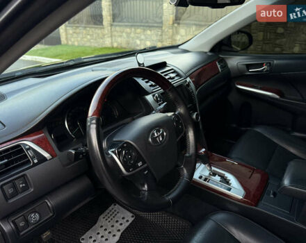 Чорний Тойота Камрі, об'ємом двигуна 3.46 л та пробігом 210 тис. км за 13500 $, фото 10 на Automoto.ua