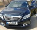 Черный Тойота Камри, объемом двигателя 2.5 л и пробегом 189 тыс. км за 14800 $, фото 1 на Automoto.ua