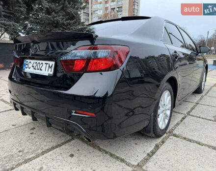 Черный Тойота Камри, объемом двигателя 2.5 л и пробегом 280 тыс. км за 9900 $, фото 18 на Automoto.ua