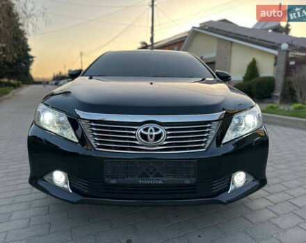 Черный Тойота Камри, объемом двигателя 2.5 л и пробегом 220 тыс. км за 13750 $, фото 2 на Automoto.ua