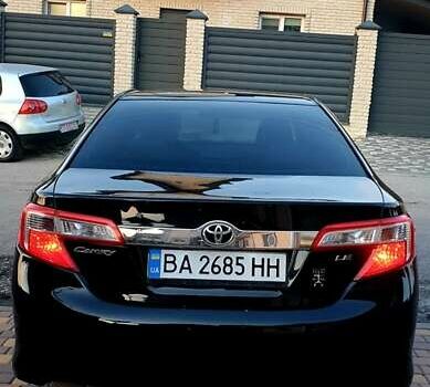 Черный Тойота Камри, объемом двигателя 2.5 л и пробегом 154 тыс. км за 9490 $, фото 1 на Automoto.ua