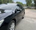 Черный Тойота Камри, объемом двигателя 2.49 л и пробегом 211 тыс. км за 14300 $, фото 1 на Automoto.ua