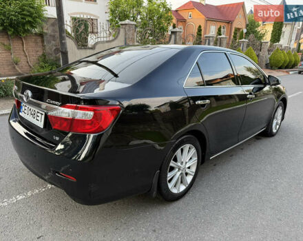 Чорний Тойота Камрі, об'ємом двигуна 3.46 л та пробігом 210 тис. км за 13500 $, фото 2 на Automoto.ua