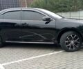 Черный Тойота Камри, объемом двигателя 2.5 л и пробегом 187 тыс. км за 11000 $, фото 1 на Automoto.ua