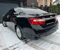 Черный Тойота Камри, объемом двигателя 2.5 л и пробегом 190 тыс. км за 13950 $, фото 1 на Automoto.ua