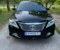 Чорний Тойота Камрі, об'ємом двигуна 2.49 л та пробігом 299 тис. км за 12300 $, фото 1 на Automoto.ua