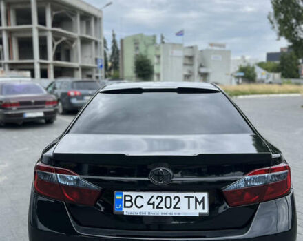 Черный Тойота Камри, объемом двигателя 2.5 л и пробегом 280 тыс. км за 12900 $, фото 4 на Automoto.ua