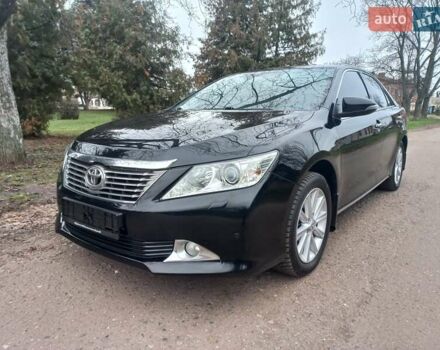 Черный Тойота Камри, объемом двигателя 2.5 л и пробегом 127 тыс. км за 15700 $, фото 2 на Automoto.ua