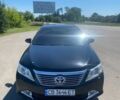 Чорний Тойота Камрі, об'ємом двигуна 2.5 л та пробігом 284 тис. км за 12000 $, фото 1 на Automoto.ua