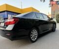 Черный Тойота Камри, объемом двигателя 2.49 л и пробегом 186 тыс. км за 13700 $, фото 4 на Automoto.ua