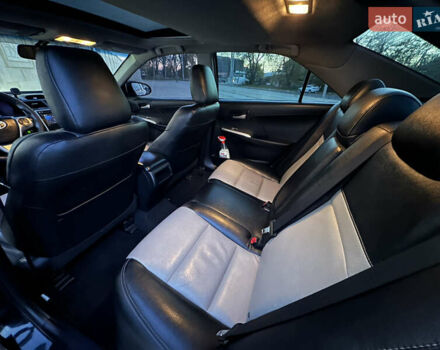 Черный Тойота Камри, объемом двигателя 2.5 л и пробегом 215 тыс. км за 11950 $, фото 27 на Automoto.ua