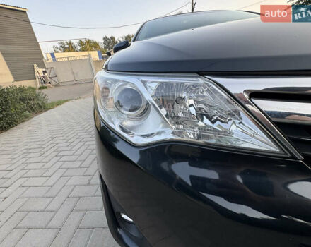 Черный Тойота Камри, объемом двигателя 2.5 л и пробегом 225 тыс. км за 13950 $, фото 23 на Automoto.ua