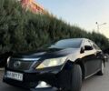 Черный Тойота Камри, объемом двигателя 2.49 л и пробегом 186 тыс. км за 13700 $, фото 1 на Automoto.ua